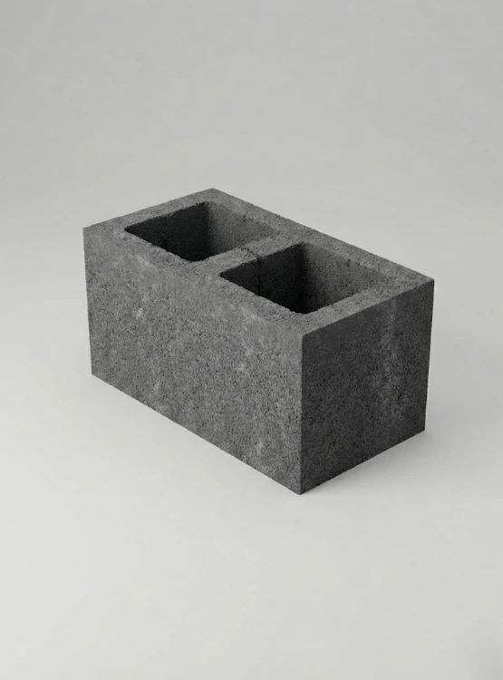 Dwukomorowy pustak betonowy na jednolitym tle, produkt z kategorii Pustaki